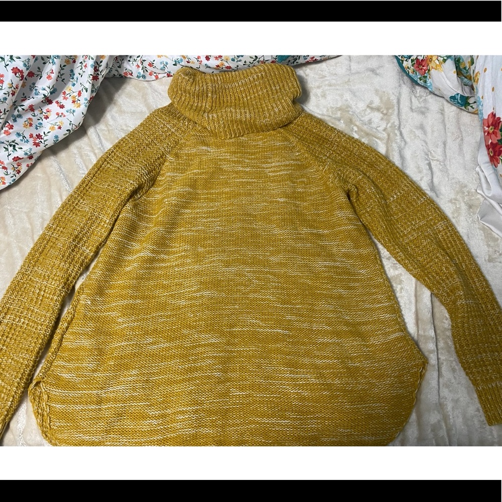 yellow turtle neck sweater